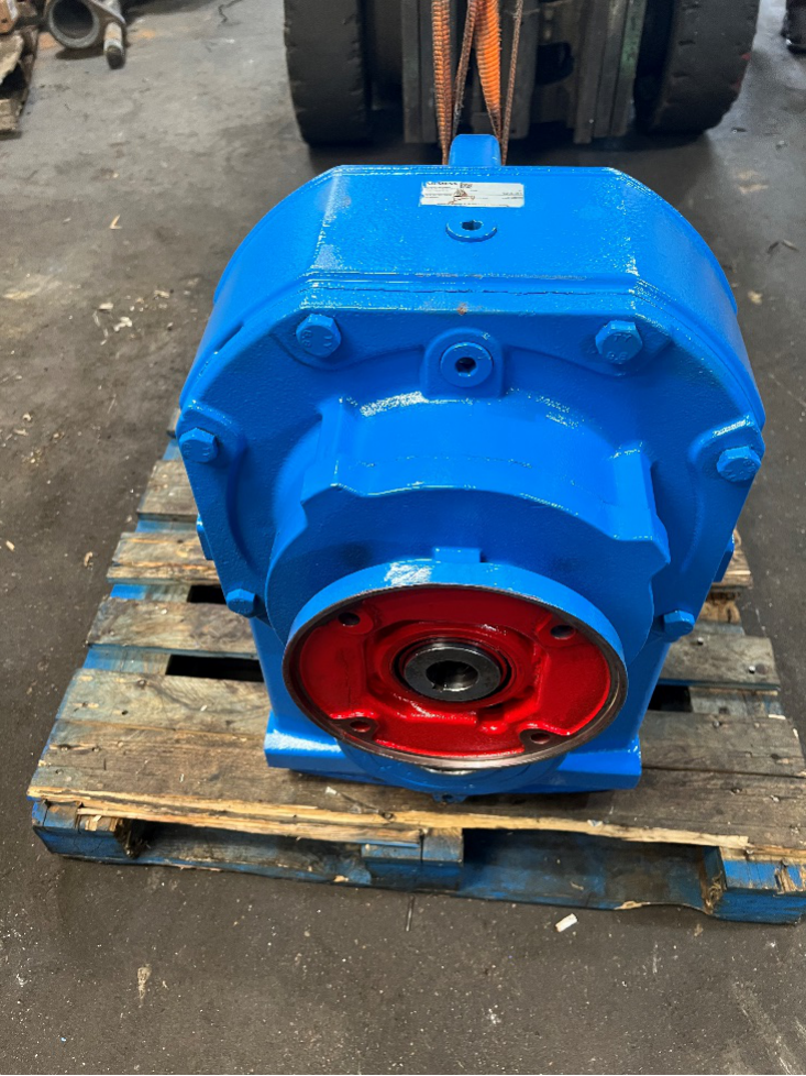A blue hydraulic pump