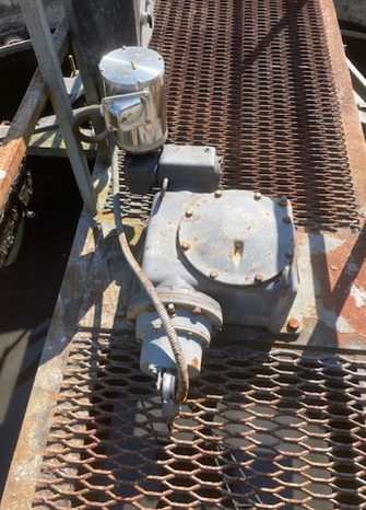 A gearbox at a repair shop after failure.
