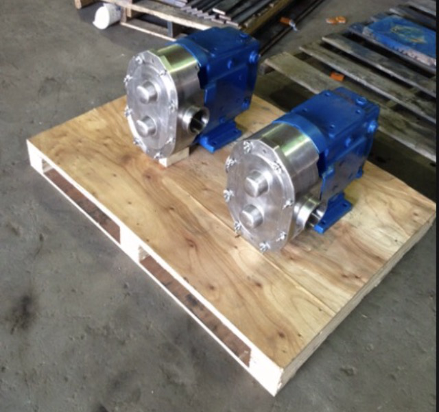 Pumps on a wooden surface.