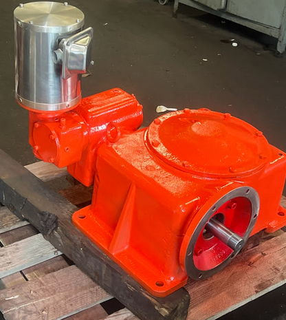 A gearbox on a wooden crate.