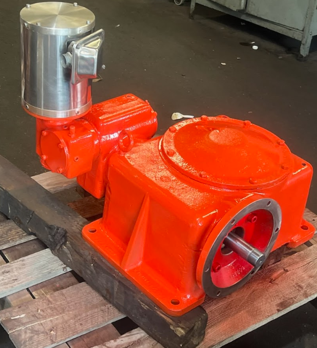 This image shows a red gearbox.